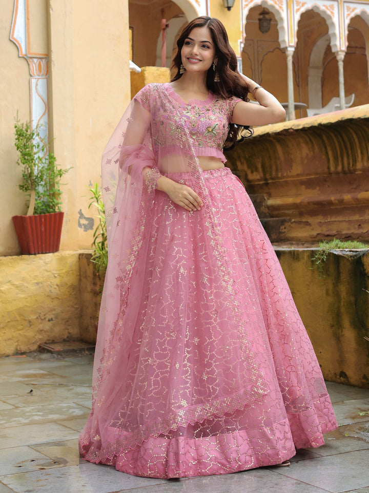 Pink Sequins Net Engagement Wear Lehenga Choli With Dupatta