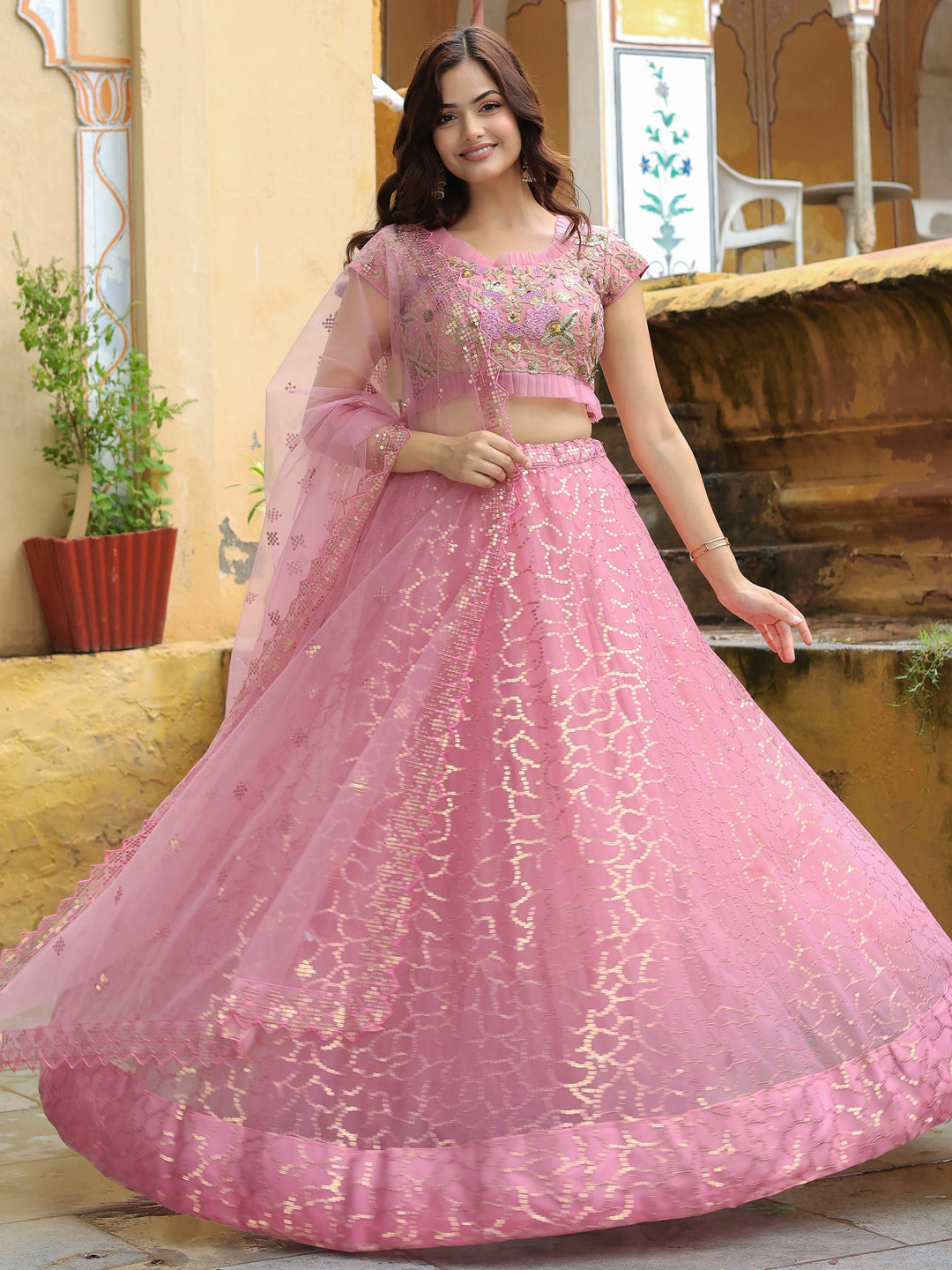 Pink Sequins Net Engagement Wear Lehenga Choli With Dupatta