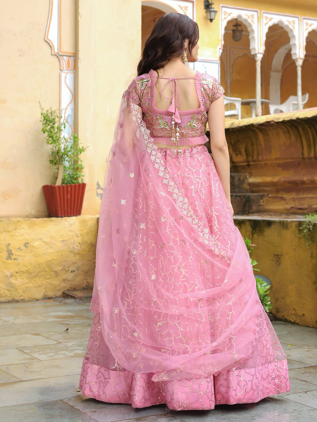 Pink Sequins Net Engagement Wear Lehenga Choli With Dupatta