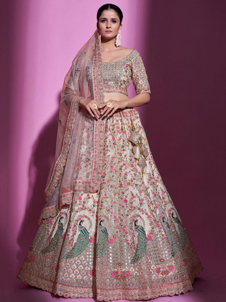 Cream Sequins Soft Net Wedding Wear Lehenga Choli