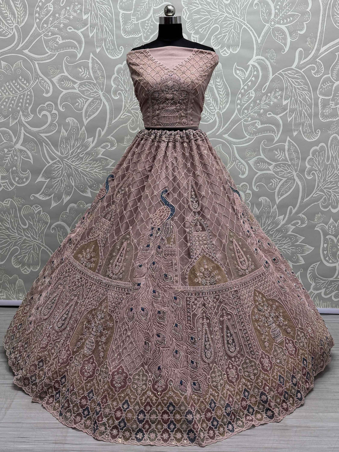 Peach Sequins Net Engagement Wear Lehenga Choli