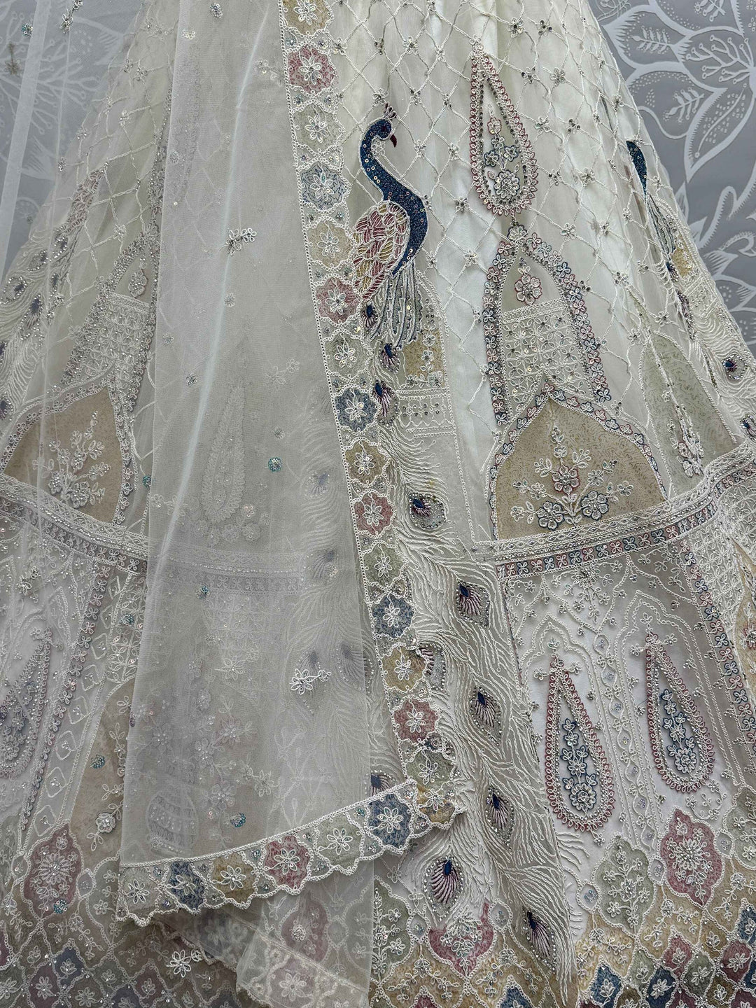 Off-White Sequins Net Wedding Lehenga Choli With Dupatta