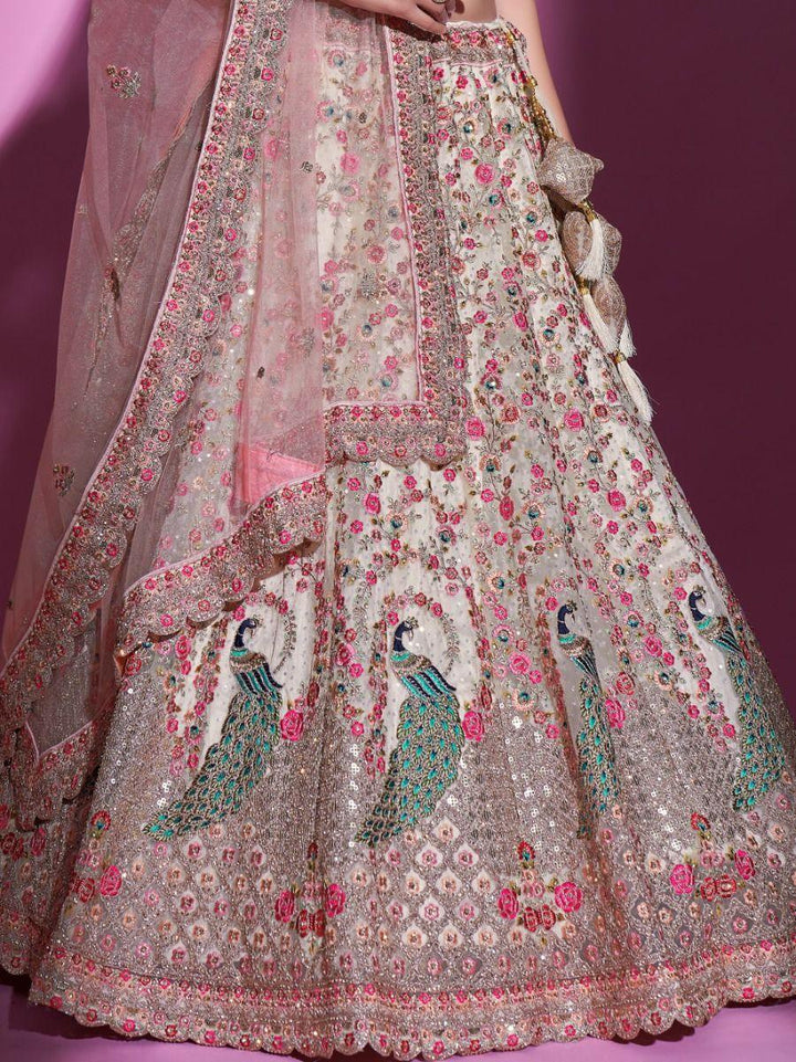 Cream Sequins Soft Net Wedding Wear Lehenga Choli