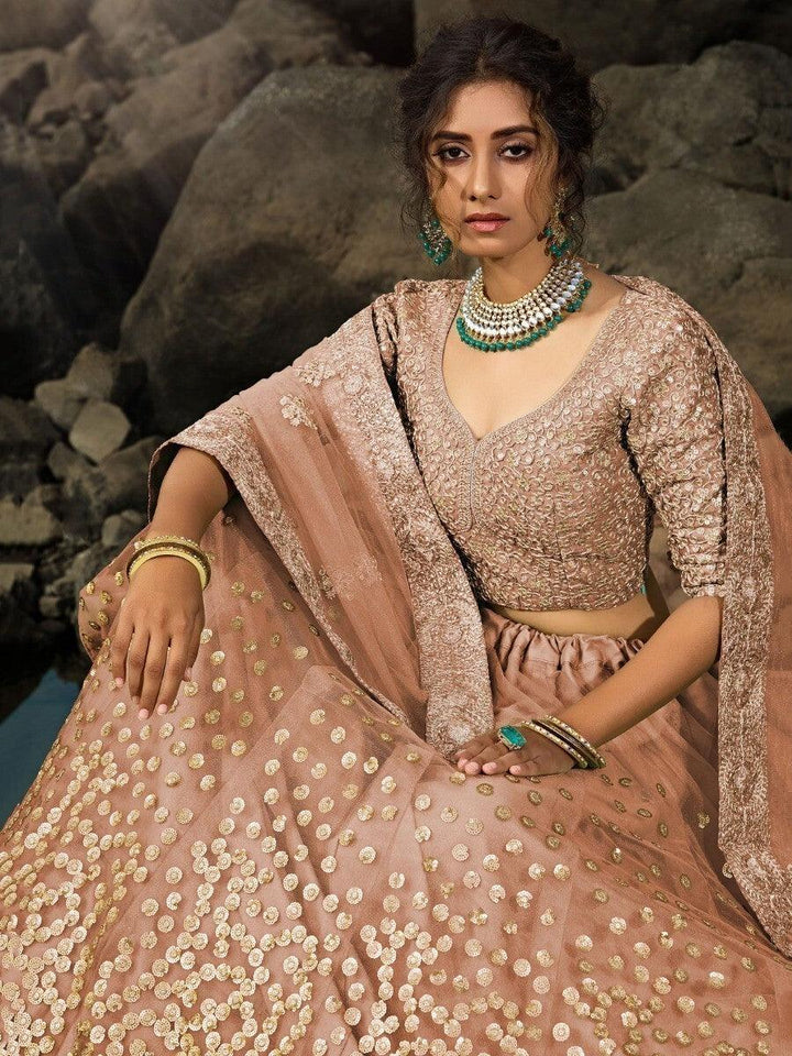 Brown Zari Worked Net Engagement Wear Lehenga Choli
