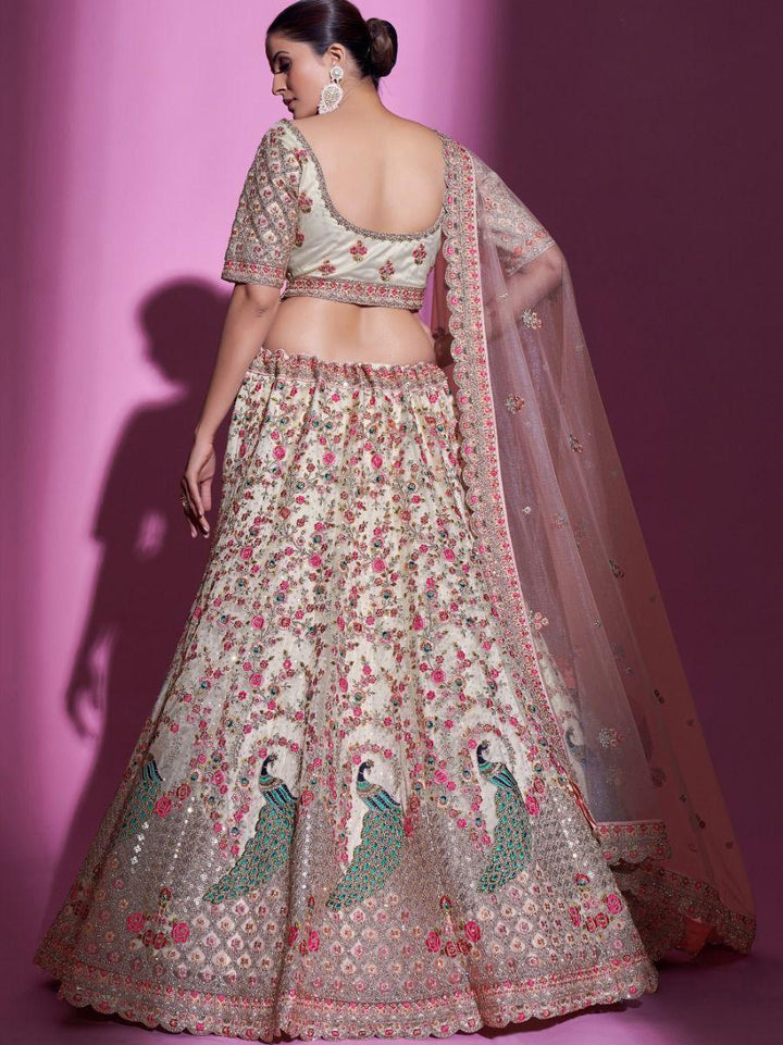 Cream Sequins Soft Net Wedding Wear Lehenga Choli