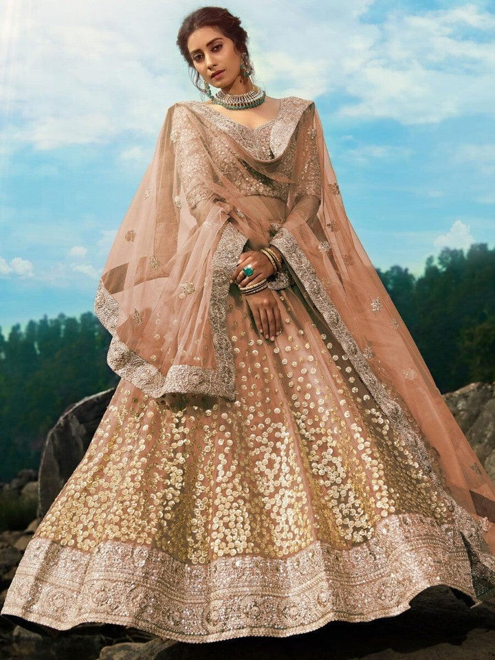 Brown Zari Worked Net Engagement Wear Lehenga Choli