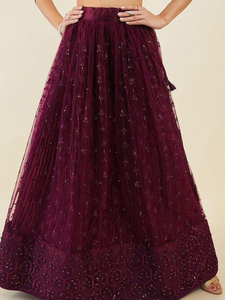 Stunning Wine Embroidered Net Wedding Wear Lehenga Choli With Dupatta