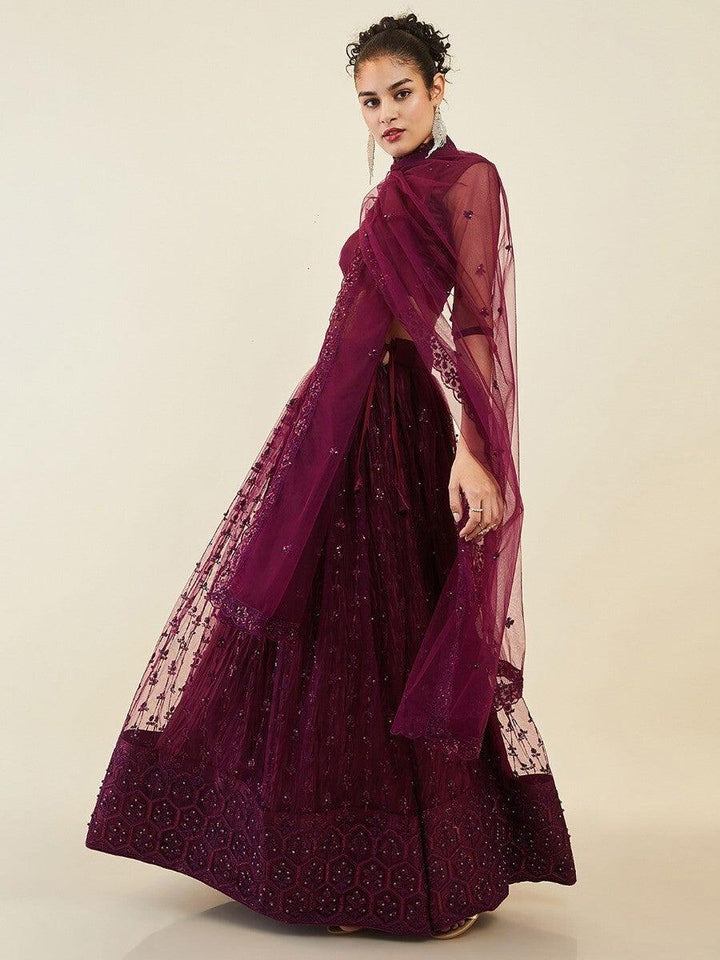 Stunning Wine Embroidered Net Wedding Wear Lehenga Choli With Dupatta
