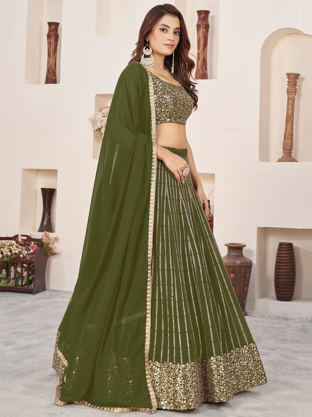 Outstanding Green Sequins Georgette Mehendi Wear Lehenga Choli