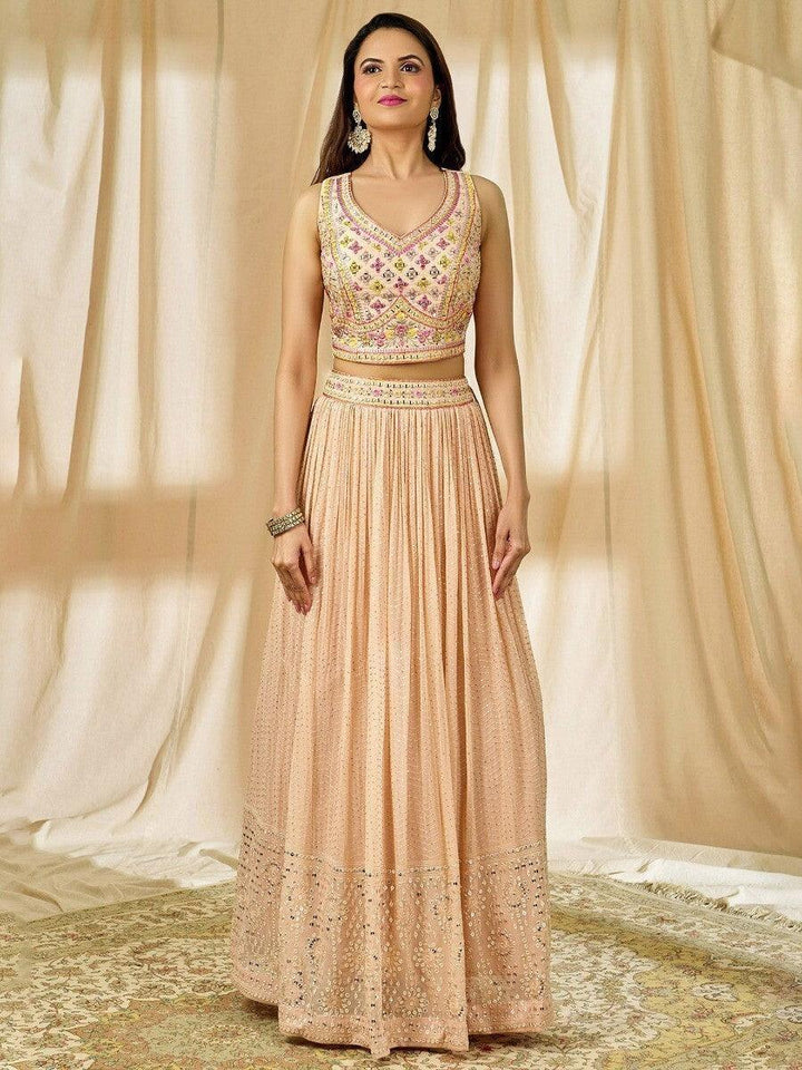 Fabulous Peach Thread Embroidered Georgette Reception Wear Lehenga Choli