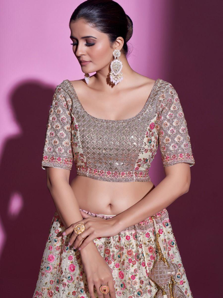 Cream Sequins Soft Net Wedding Wear Lehenga Choli