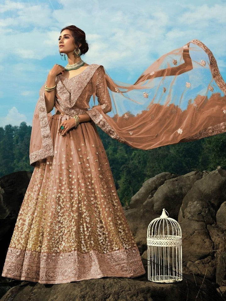 Brown Zari Worked Net Engagement Wear Lehenga Choli