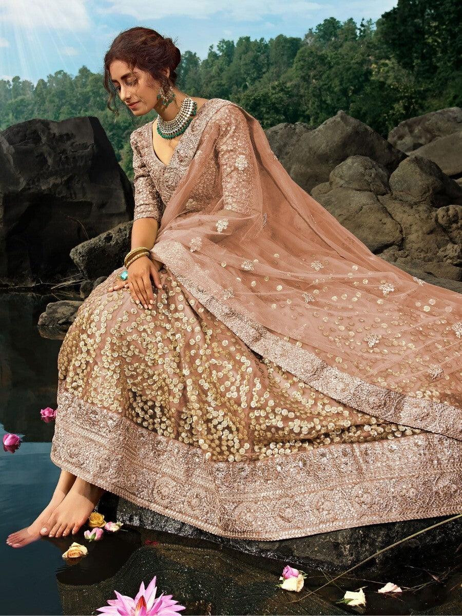 Brown Zari Worked Net Engagement Wear Lehenga Choli