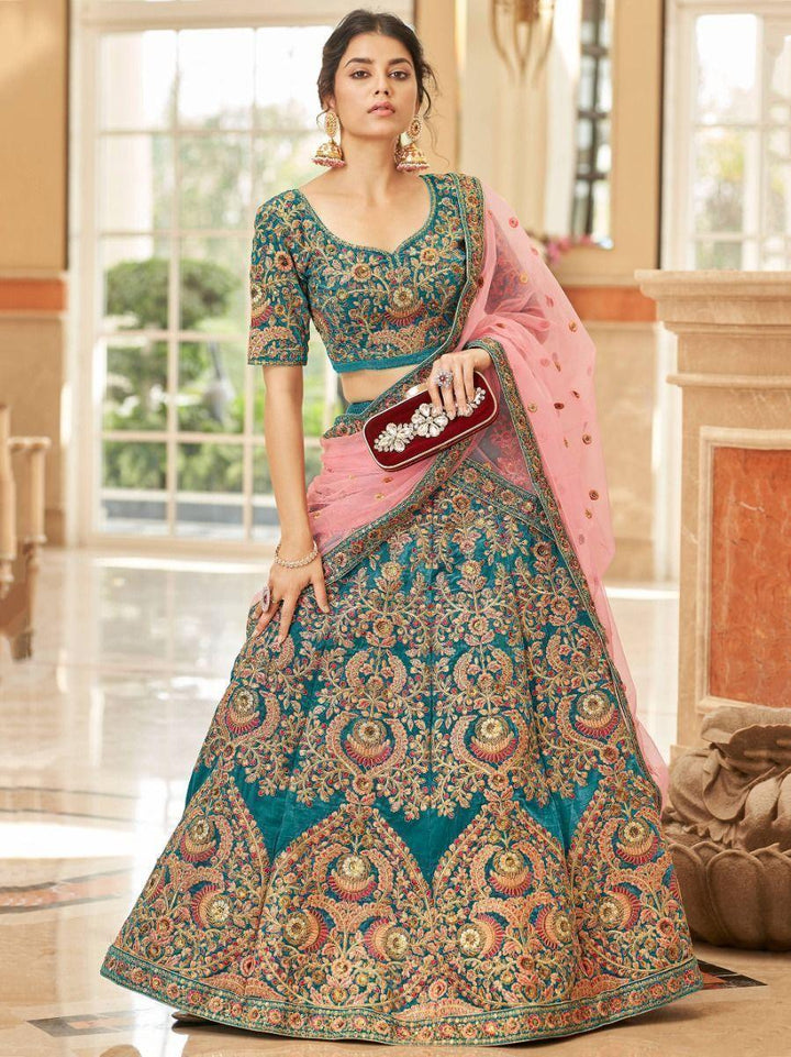 Teal Blue Embroidered Velvet Bridal Wear Lehenga Choli