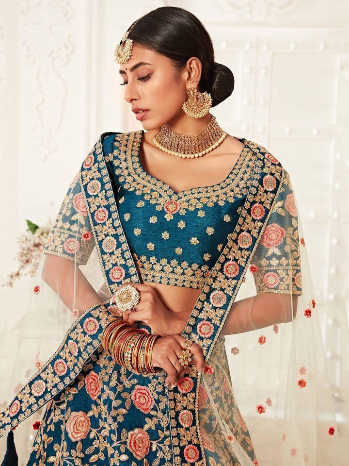 Teal Blue Embroidered Silk Bridal Wear Lehenga Choli