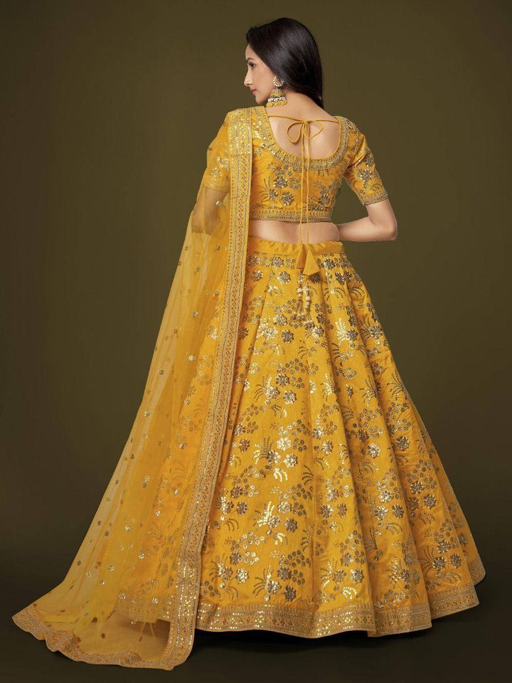 Attractive Yellow Sequins Slub Silk Wedding Wear Lehenga Choli