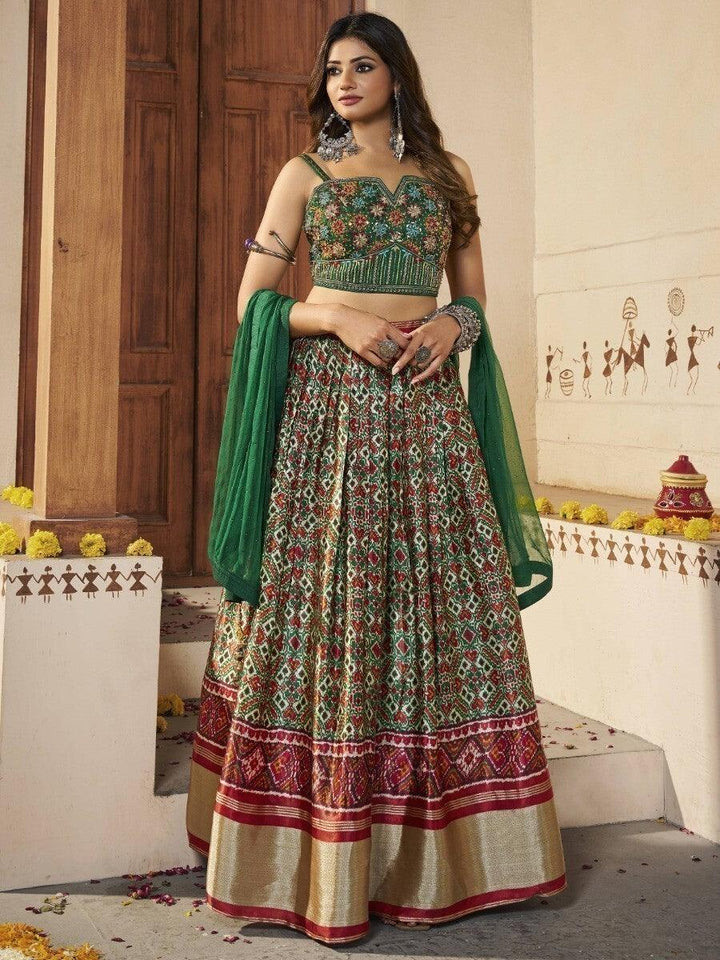 Green Patola Silk Sangeet Wear Lehenga With Embroidered Choli