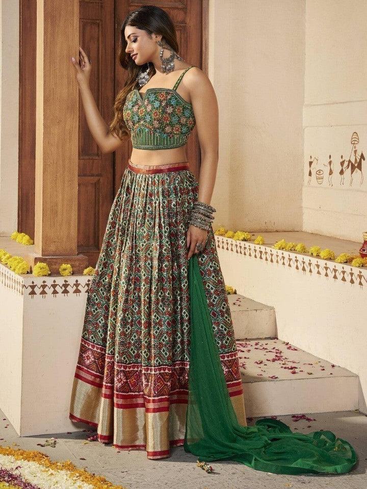 Green Patola Silk Sangeet Wear Lehenga With Embroidered Choli