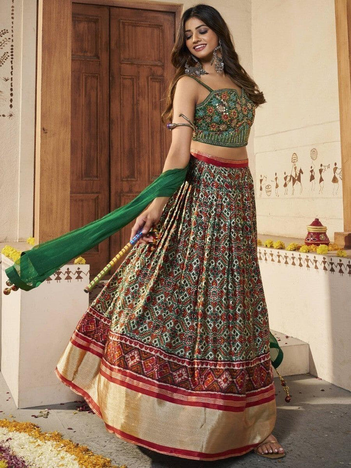 Awesome Green Patola Silk Sangeet Wear Lehenga With Embroidered Choli