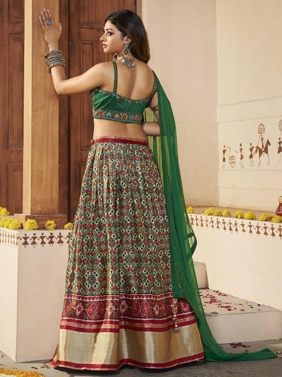 Green Patola Silk Sangeet Wear Lehenga With Embroidered Choli