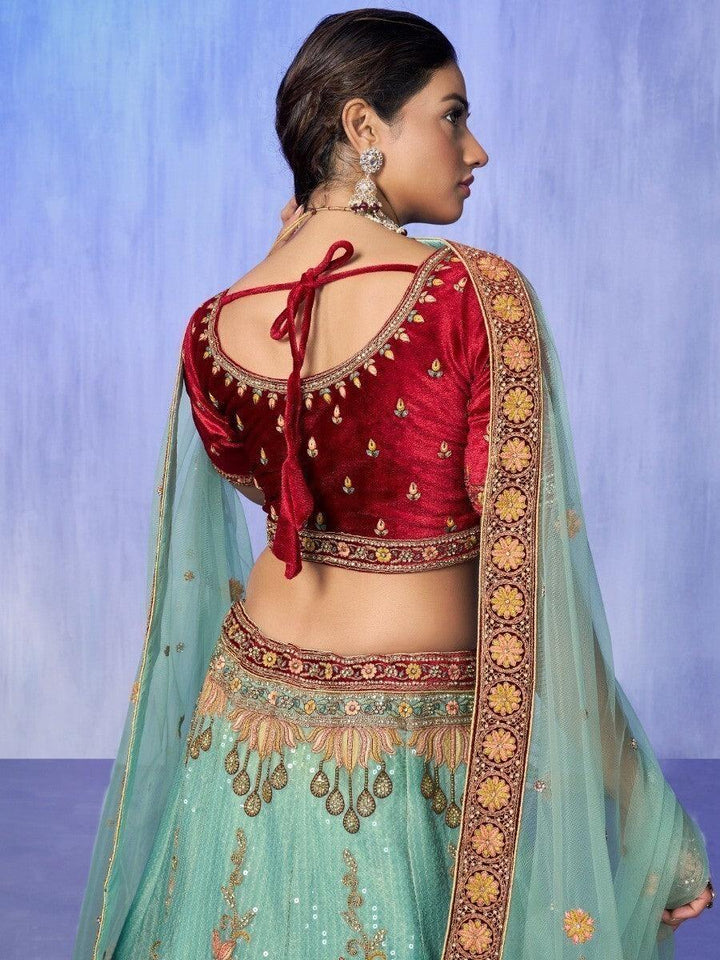 Enticing Turquoise Embroidered Velvet Lehenga Choli With Dupatta