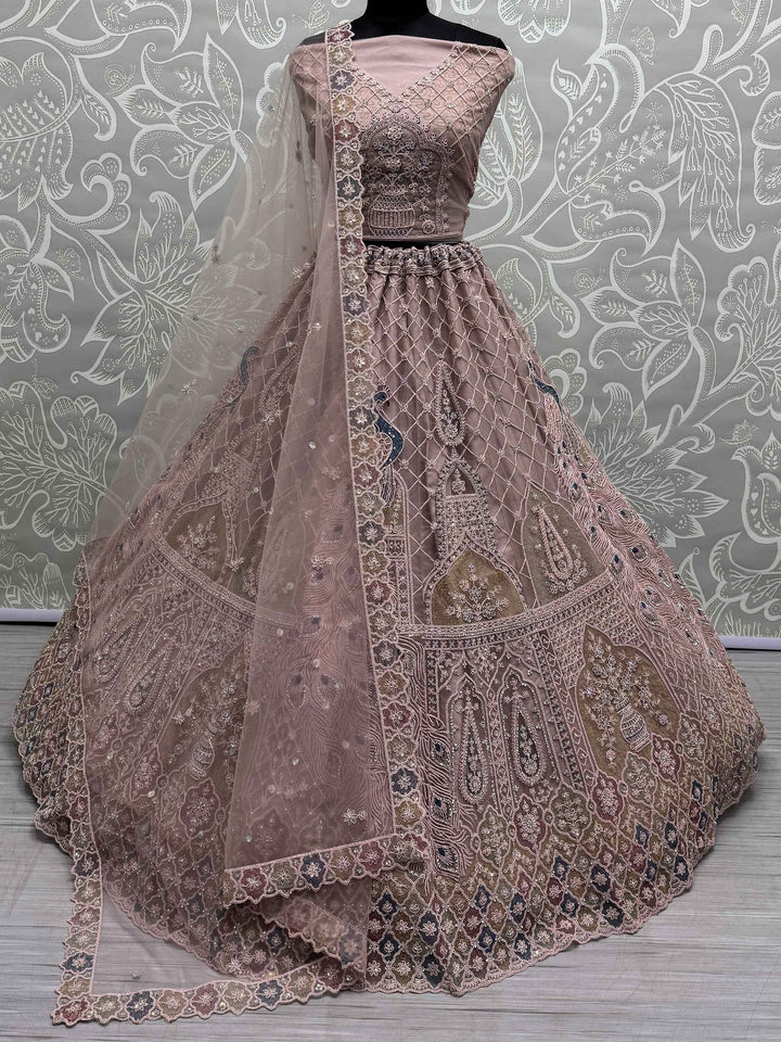 Peach Sequins Net Engagement Wear Lehenga Choli