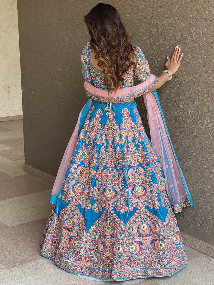 Blue Embroidered Velvet Wedding Wear Lehenga Choli