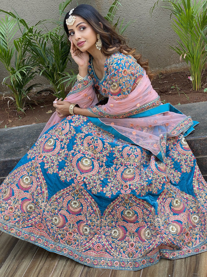 Blue Embroidered Velvet Wedding Wear Lehenga Choli