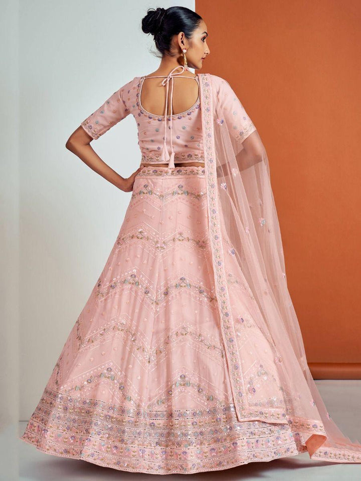 Attractive Peach Sequins Georgette Lehenga Choli With Net Dupatta