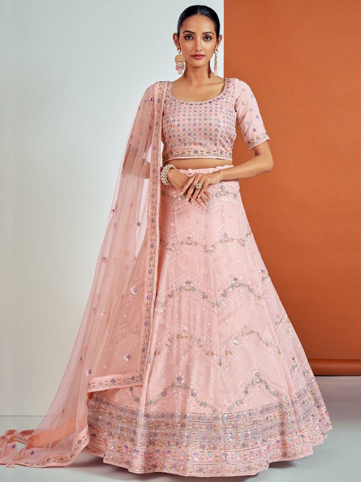 Attractive Peach Sequins Georgette Lehenga Choli With Net Dupatta