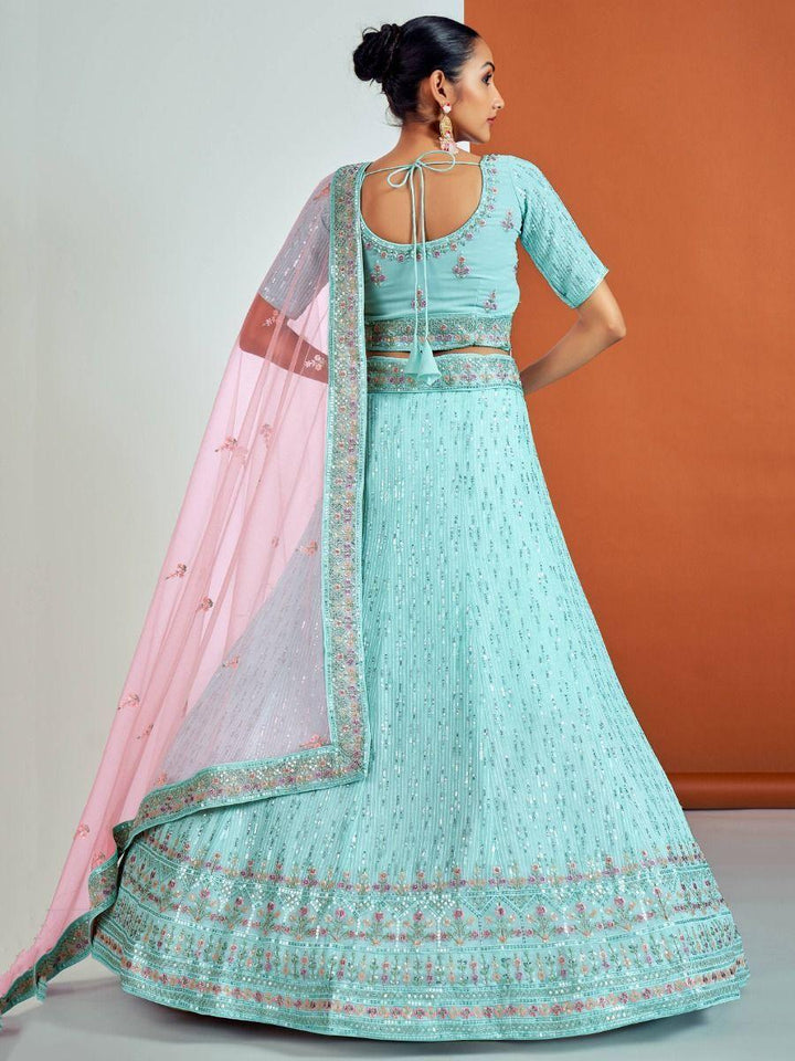 Turquoise Sequins Georgette Wedding Wear Lehenga Choli