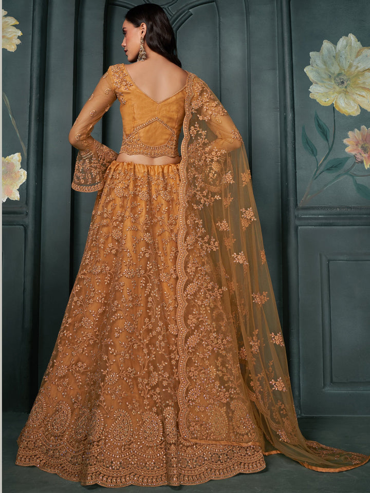 Fascinating Orange Thread Work Net Engagement Wear Lehenga Choli