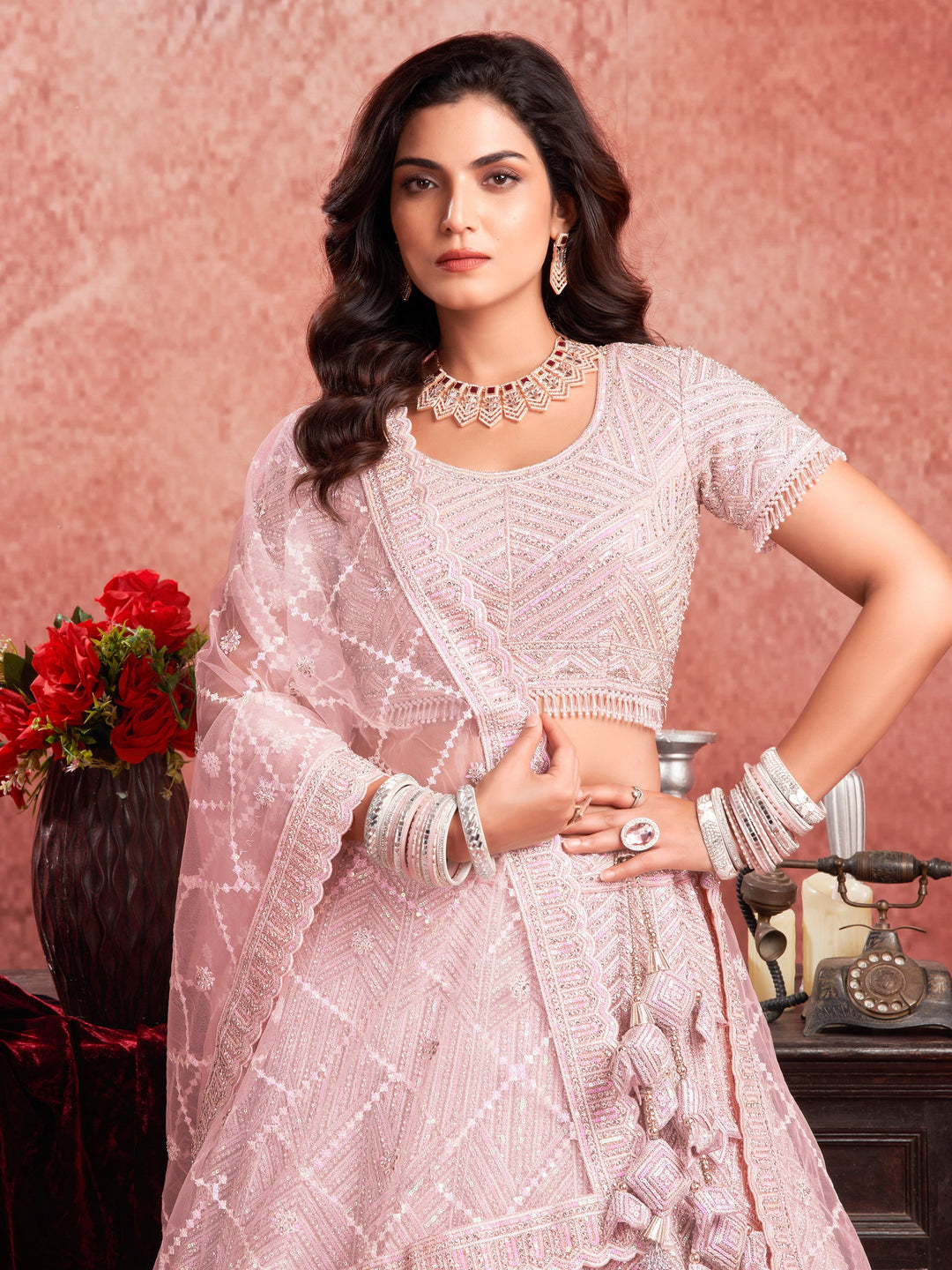 Adorable Baby Pink Sequins Work Net Engagement Wear Lehenga Choli