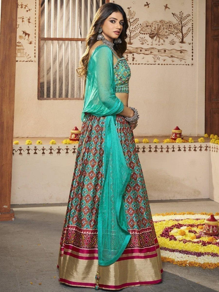 Attractive Turquoise Patola Print Silk Lehenga With Embroidered Choli