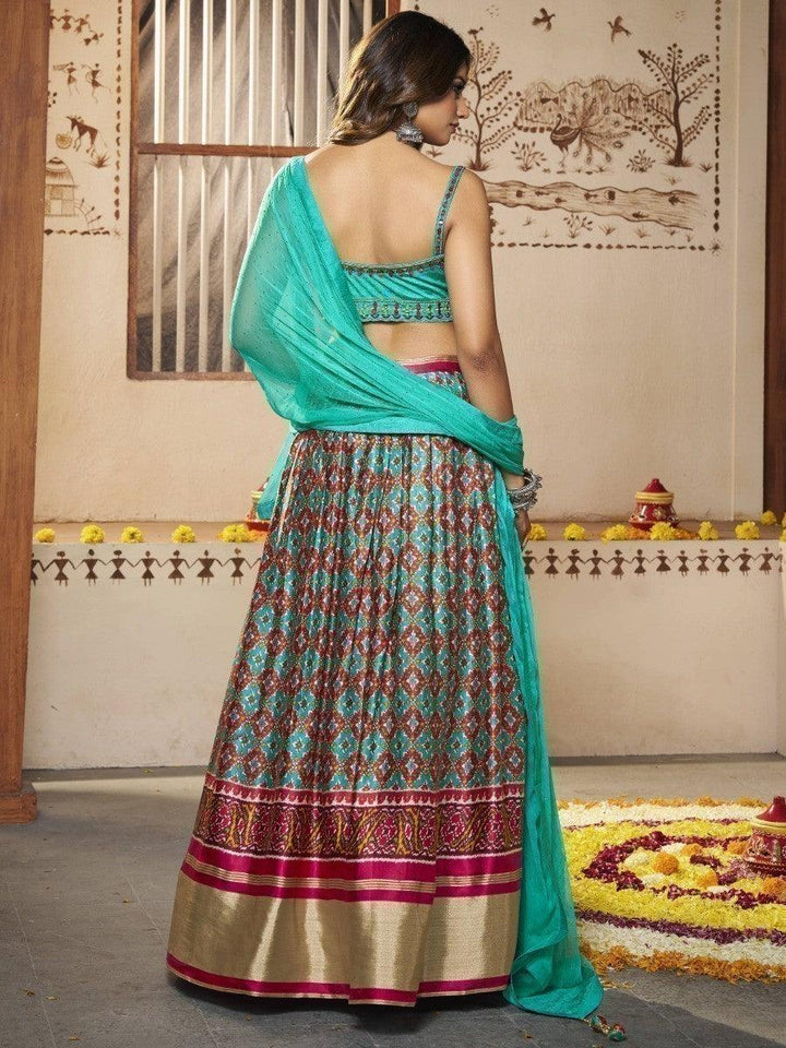 Attractive Turquoise Patola Print Silk Lehenga With Embroidered Choli