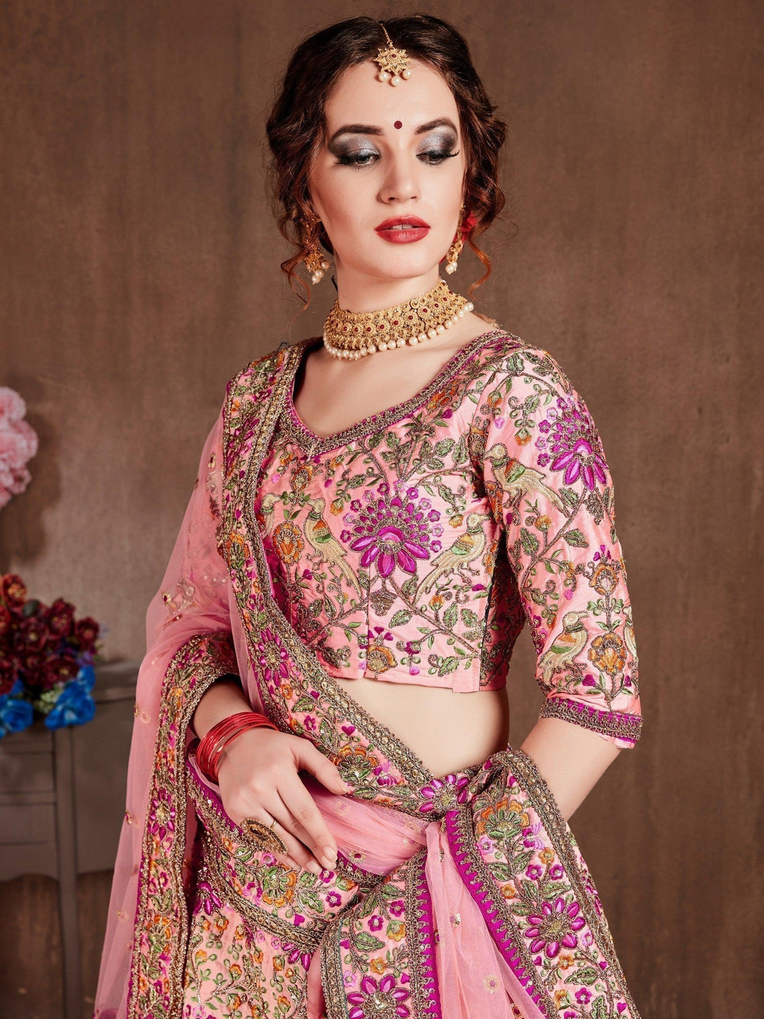 Arresting Pastel Pink Colored Bridal Wear Designer Embroidered Lehenga choli