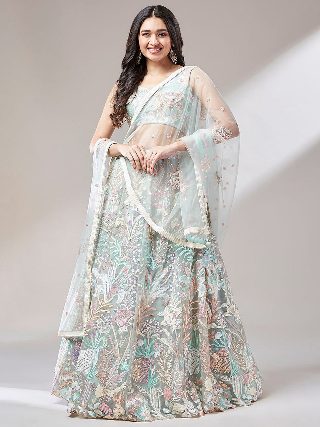 Pista Green Sequins Net Wedding Wear Lehenga Choli