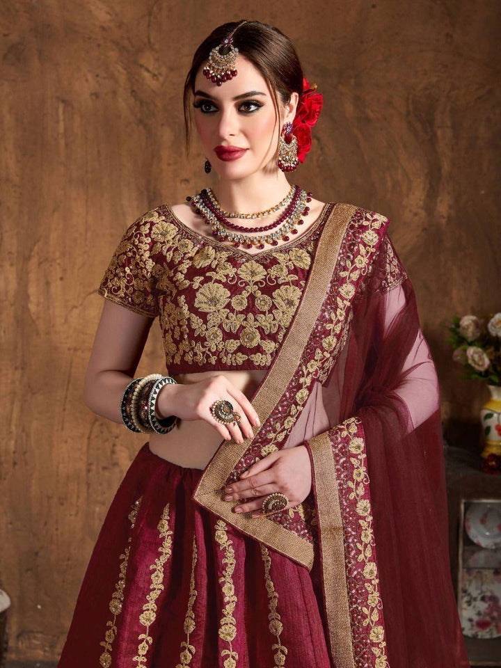 Maroon Embroidered Raw Silk Lehenga Choli With Dupatta