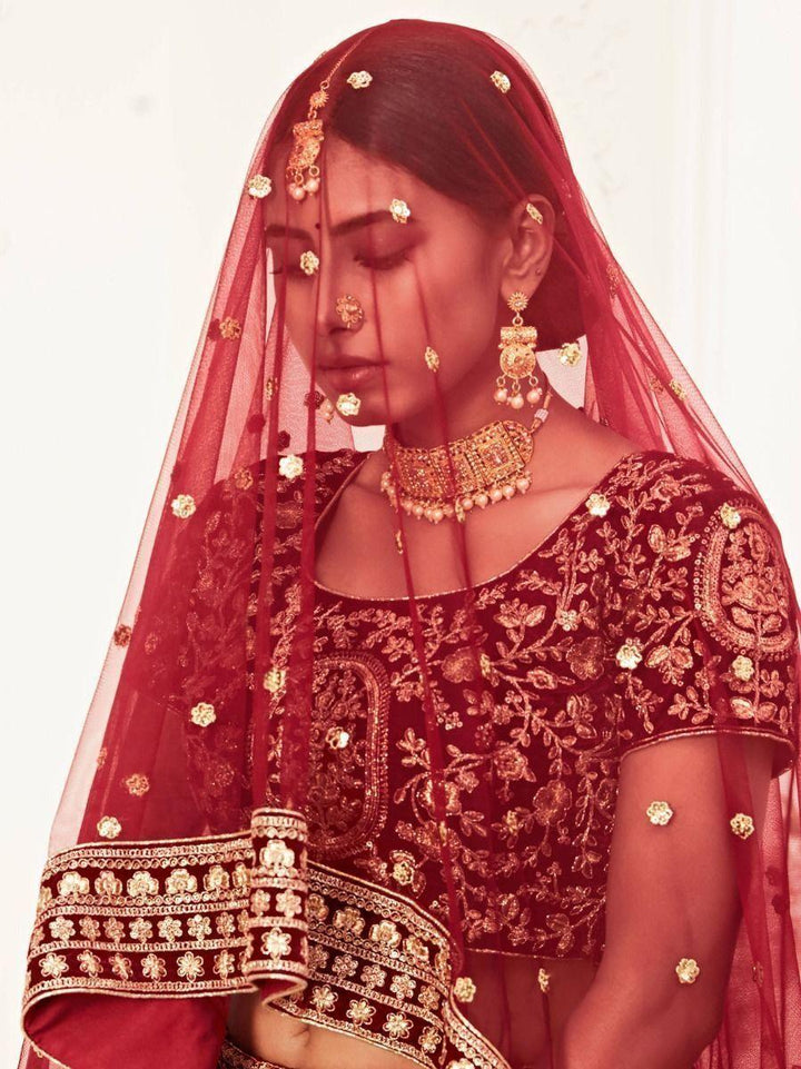 Impressive Red Embroidered Work Velvet Bridal Wear Lehenga Choli