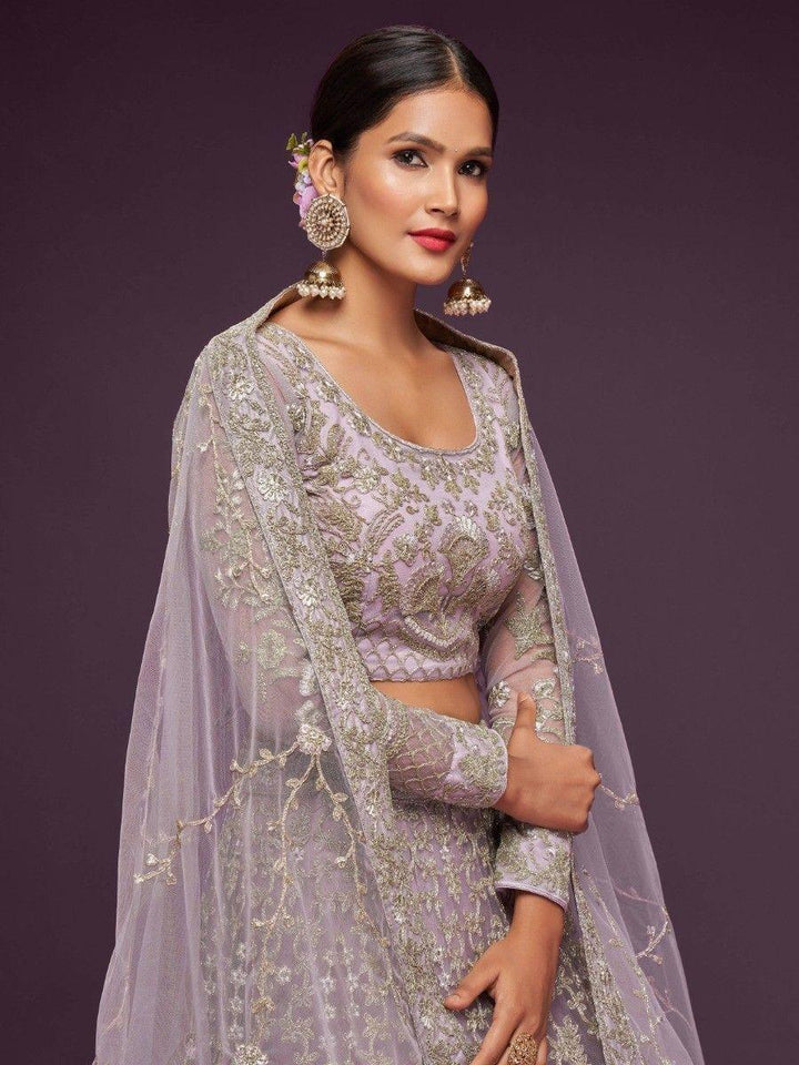 Attractive Lilac Embroidered Soft Net Wedding Wear Lehenga Choli