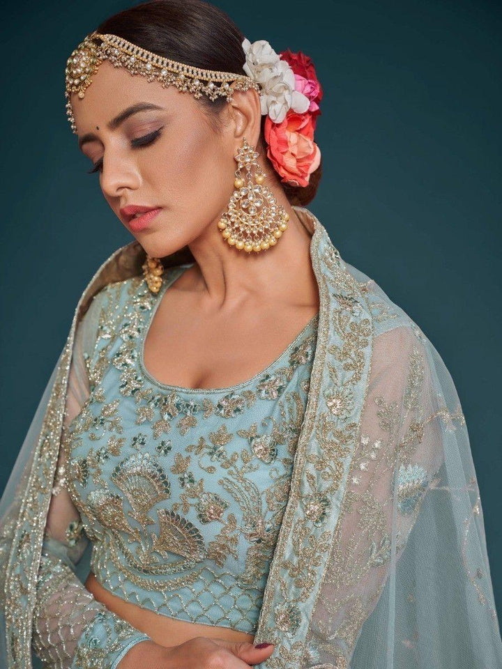 Fetching Aqua Blue Embroidered Soft Net Lehenga Choli With Dupatta