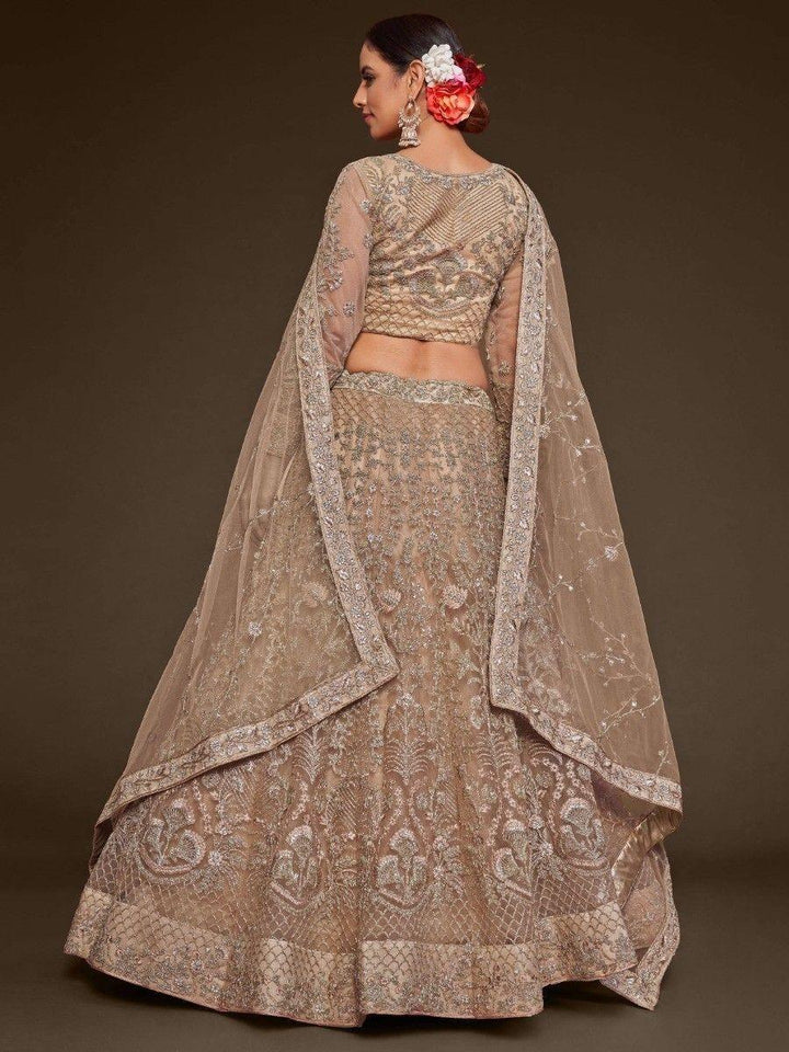 Cute Royal Beige Embroidered Soft Net Engagement Wear Lehenga Choli