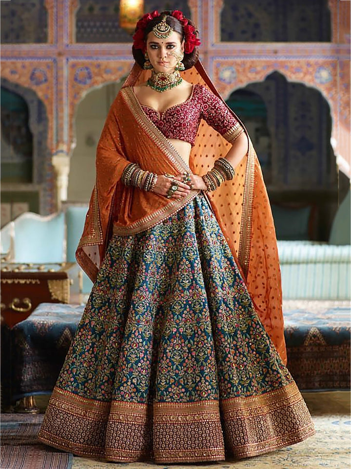 Blue-Red Colored Bridal wear Embroidered Lehenga Choli
