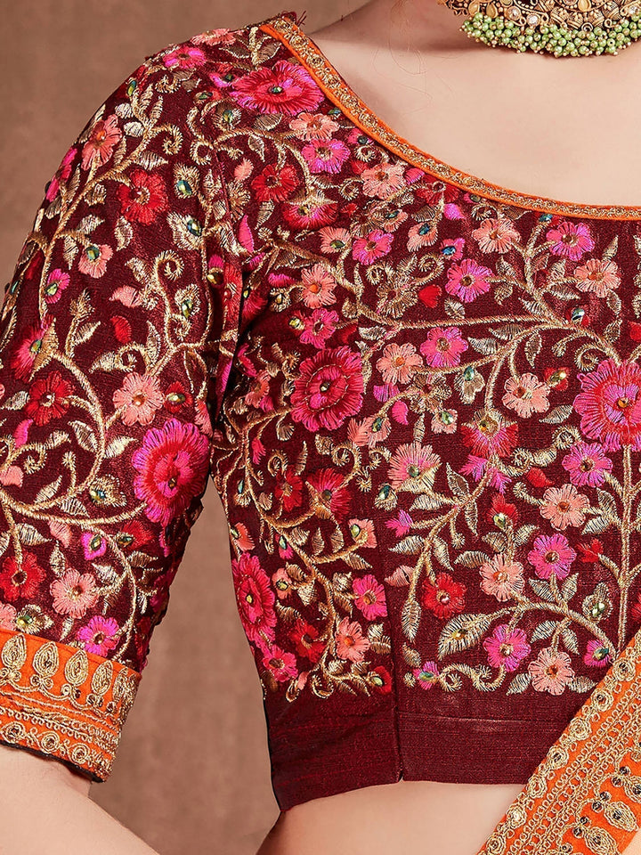 Blue-Red Colored Bridal wear Embroidered Lehenga Choli