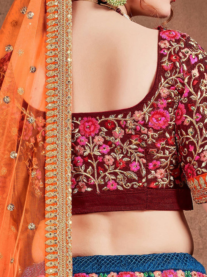 Blue-Red Colored Bridal wear Embroidered Lehenga Choli