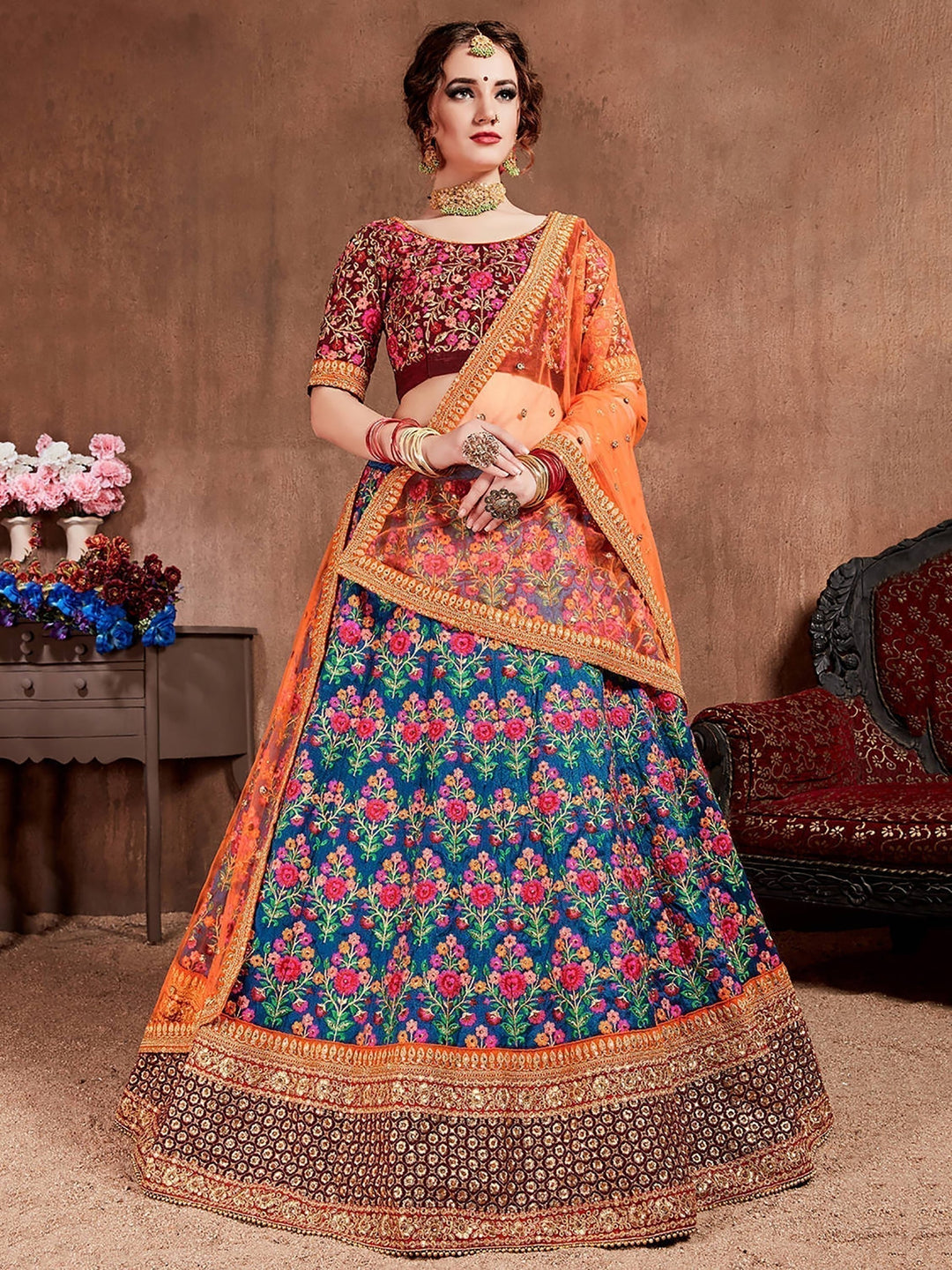 Blue-Red Colored Bridal wear Embroidered Lehenga Choli