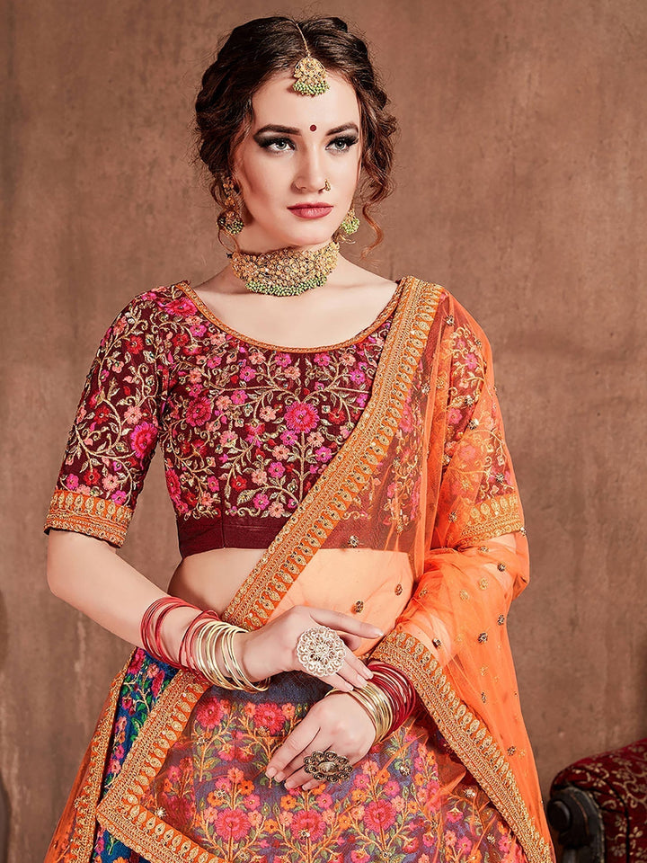 Blue-Red Colored Bridal wear Embroidered Lehenga Choli