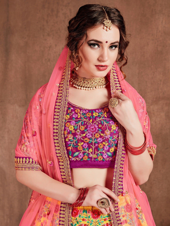 Flamboyant Yellow-Pink Colored Bridal wear Embroidered Lehenga Choli