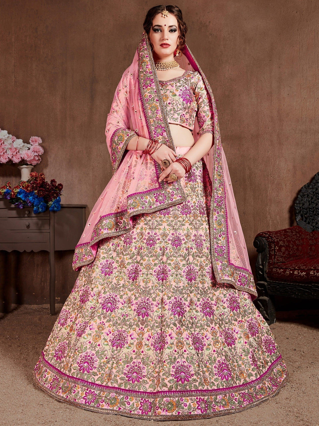 peach Colored Bridal wear Embroidered Lehenga Choli
